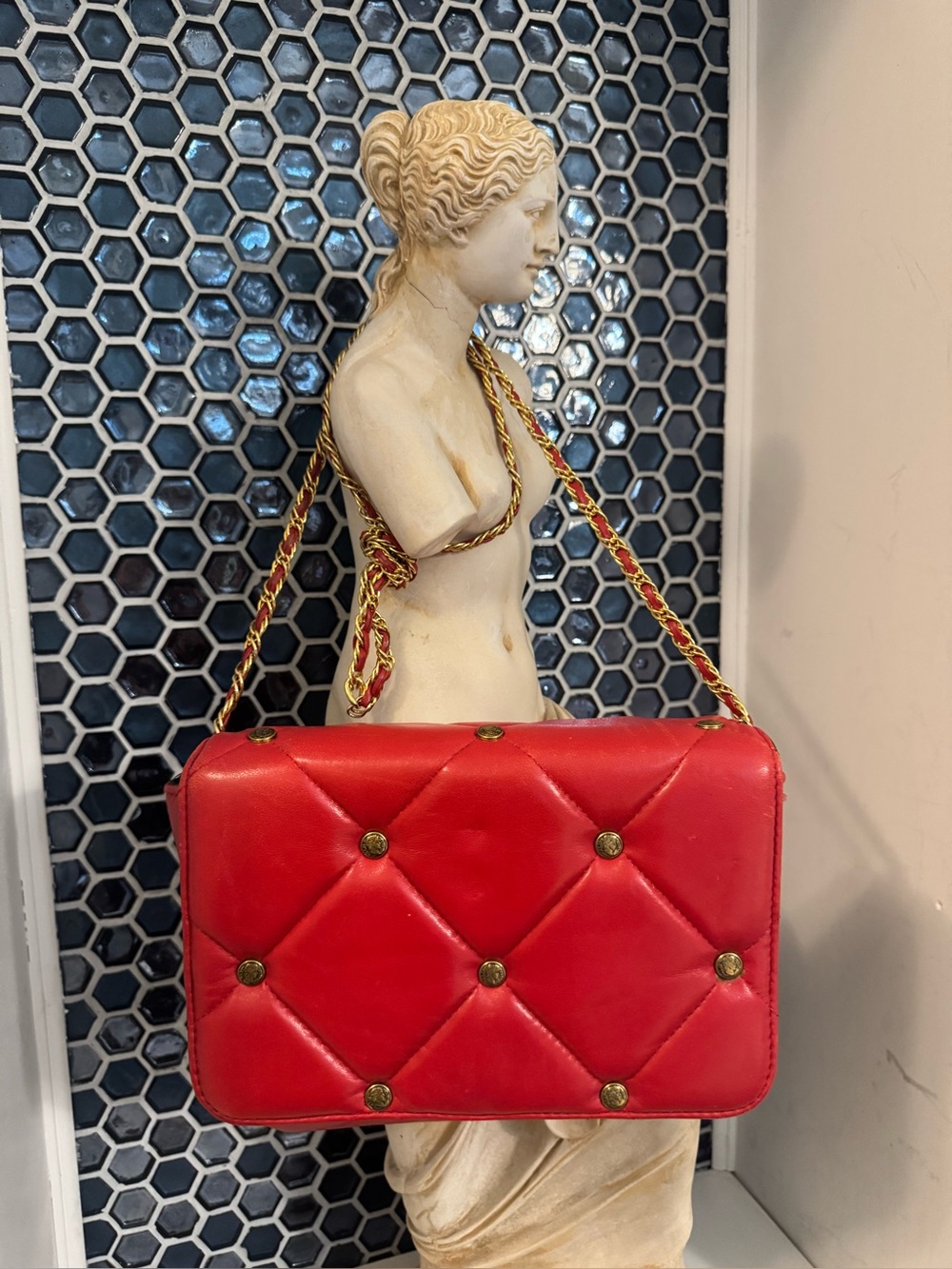 Vintage L.J. Simone Red Quilted Shoulder Bag with Greco-Roman Coins.